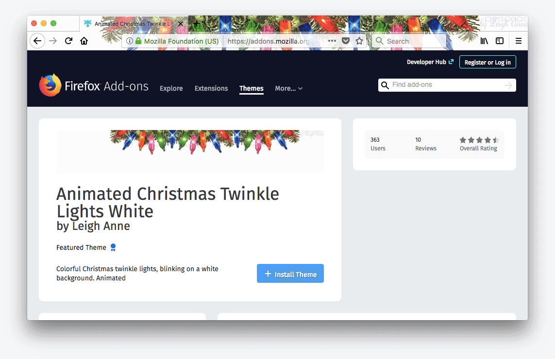 Firefox 57 with a Christmas theme by Leigh Ann, featuring blinking Christmas lights.